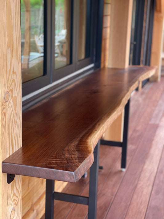 Walnut slab bar height table